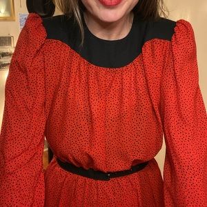 Vintage red dress with black polkadot shapes